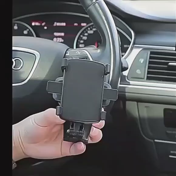 Load video: 360° Rotatable Dashboard &amp; Sun Visor Car Phone Holder